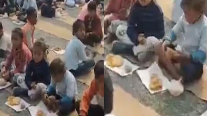 ठंड में बच्चों को नीचे बिठाया, रद्दी वाले कागज पर परोसा हलवा-पूड़ी; सिस्टम की खुली पोल
